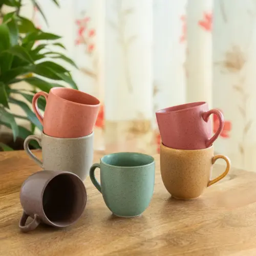ExclusiveLane 'Colour Story' Ceramic Tea And Coffee Mugs (Set of 6, 200 ML, Microwave Safe, Hand-Painted) ExclusiveLane 'Colour Story' Ceramic Tea And Coffee Mugs (Set of 6, 200 ML, Microwave Safe, Hand-Painted)