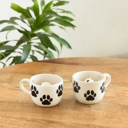 ExclusiveLane 'Furry Friend Suprise' Ceramic Tea And Coffee Mugs (Set of 2, 210 ML, Microwave Safe, Hand-Embossed) ExclusiveLane 'Furry Friend Suprise' Ceramic Tea And Coffee Mugs (Set of 2, 210 ML, Microwave Safe, Hand-Embossed)