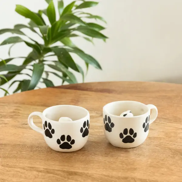 ExclusiveLane 'Furry Friend Suprise' Ceramic Tea And Coffee Mugs (Set of 2, 210 ML, Microwave Safe, Hand-Embossed) ExclusiveLane 'Furry Friend Suprise' Ceramic Tea And Coffee Mugs (Set of 2, 210 ML, Microwave Safe, Hand-Embossed)