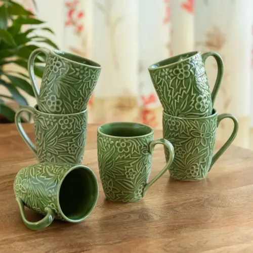 ExclusiveLane 'Green Flora' Ceramic Tea And Coffee Mugs (Set of 6, 290 ML, Microwave Safe, Hand-Embossed) ExclusiveLane 'Green Flora' Ceramic Tea And Coffee Mugs (Set of 6, 290 ML, Microwave Safe, Hand-Embossed)