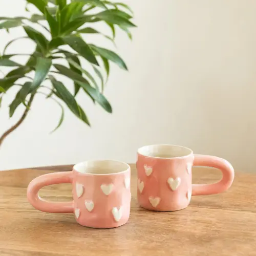 ExclusiveLane 'Heart Bump' Ceramic Tea And Coffee Mugs (Set of 2, 260 ML, Microwave Safe, Hand-Embossed)