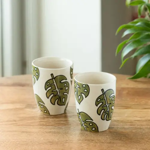 ExclusiveLane 'Leaf Foliage' Ceramic Tea And Coffee Mugs (Set of 2, 280 ML, Microwave Safe, Hand-Painted) ExclusiveLane 'Leaf Foliage' Ceramic Tea And Coffee Mugs (Set of 2, 280 ML, Microwave Safe, Hand-Painted)