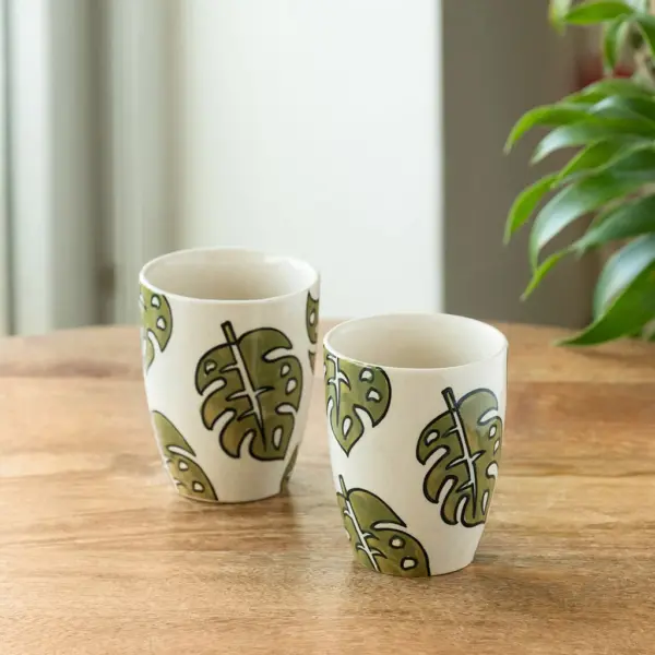 ExclusiveLane 'Leaf Foliage' Ceramic Tea And Coffee Mugs (Set of 2, 280 ML, Microwave Safe, Hand-Painted) ExclusiveLane 'Leaf Foliage' Ceramic Tea And Coffee Mugs (Set of 2, 280 ML, Microwave Safe, Hand-Painted)