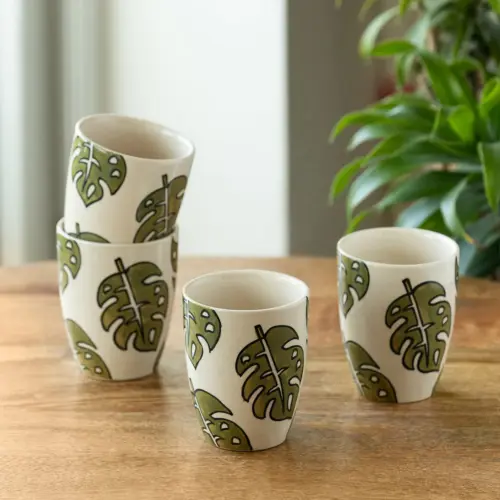 ExclusiveLane 'Leaf Foliage' Ceramic Tea And Coffee Mugs (Set of 4, 280 ML, Microwave Safe, Hand-Painted) ExclusiveLane 'Leaf Foliage' Ceramic Tea And Coffee Mugs (Set of 4, 280 ML, Microwave Safe, Hand-Painted)