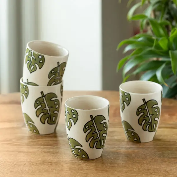 ExclusiveLane 'Leaf Foliage' Ceramic Tea And Coffee Mugs (Set of 4, 280 ML, Microwave Safe, Hand-Painted) ExclusiveLane 'Leaf Foliage' Ceramic Tea And Coffee Mugs (Set of 4, 280 ML, Microwave Safe, Hand-Painted)