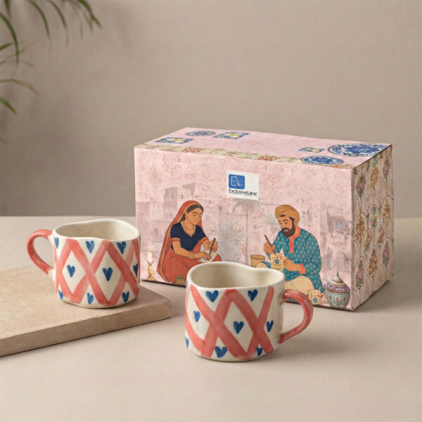 ExclusiveLane 'Sweetheart' Ceramic Tea And Coffee Mugs (Set of 2, 300 ML, Microwave Safe, Hand-Painted) ExclusiveLane 'Sweetheart' Ceramic Tea And Coffee Mugs (Set of 2, 300 ML, Microwave Safe, Hand-Painted)