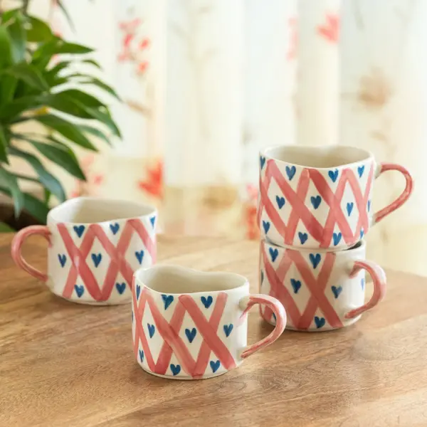 ExclusiveLane 'Sweetheart' Ceramic Tea And Coffee Mugs (Set of 4, 300 ML, Microwave Safe, Hand-Painted) ExclusiveLane 'Sweetheart' Ceramic Tea And Coffee Mugs (Set of 4, 300 ML, Microwave Safe, Hand-Painted)