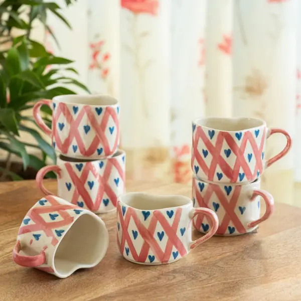 ExclusiveLane 'Sweetheart' Ceramic Tea And Coffee Mugs (Set of 6, 300 ML, Microwave Safe, Hand-Painted) ExclusiveLane 'Sweetheart' Ceramic Tea And Coffee Mugs (Set of 6, 300 ML, Microwave Safe, Hand-Painted)