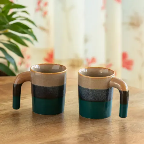 ExclusiveLane 'Two-Toned Glazed' Ceramic Tea And Coffee Mugs (Set of 2, 300 ML, Microwave Safe, Hand Galzed) ExclusiveLane 'Two-Toned Glazed' Ceramic Tea And Coffee Mugs (Set of 2, 300 ML, Microwave Safe, Hand Galzed)